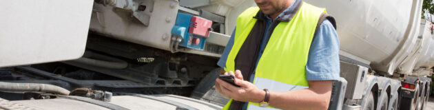 Logistic concept with businessman holding digital tablet use for import, export and logistic background.