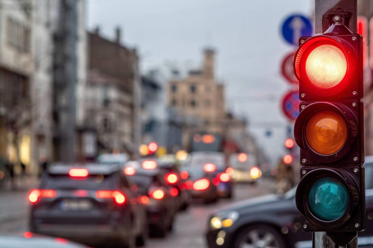 traffic lights on a busy street in the city centre.