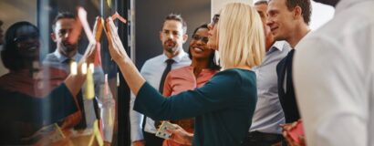 Team meeting around a whiteboard