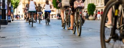 cyclists on a bike path in the city
