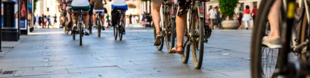 cyclists on a bike path in the city